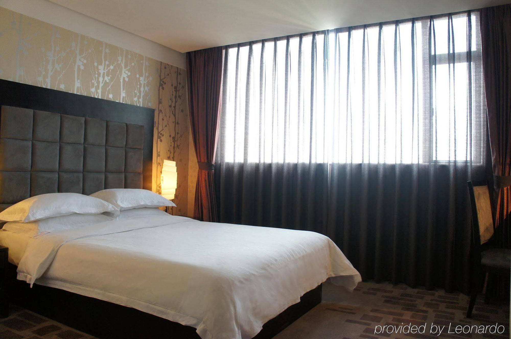 Henry Business Hotel Гуанчжоу Екстер'єр фото